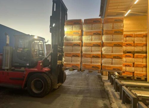 Jag vill köpa en hel lastbil med spånbalar